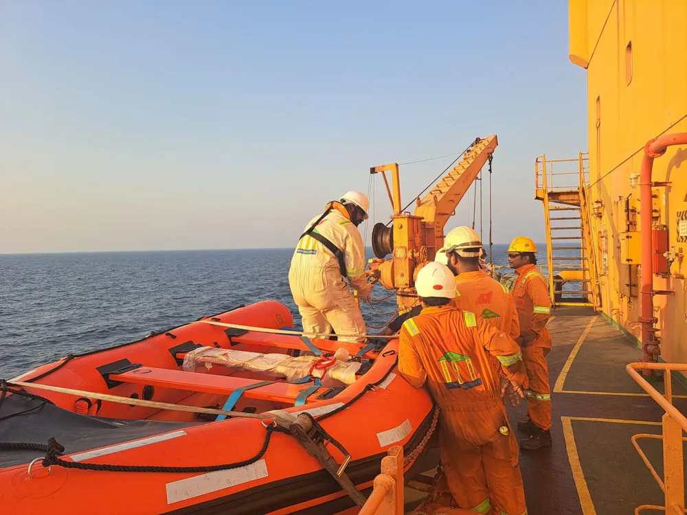 Maritime crew coordinating their work on a vessel’s deck